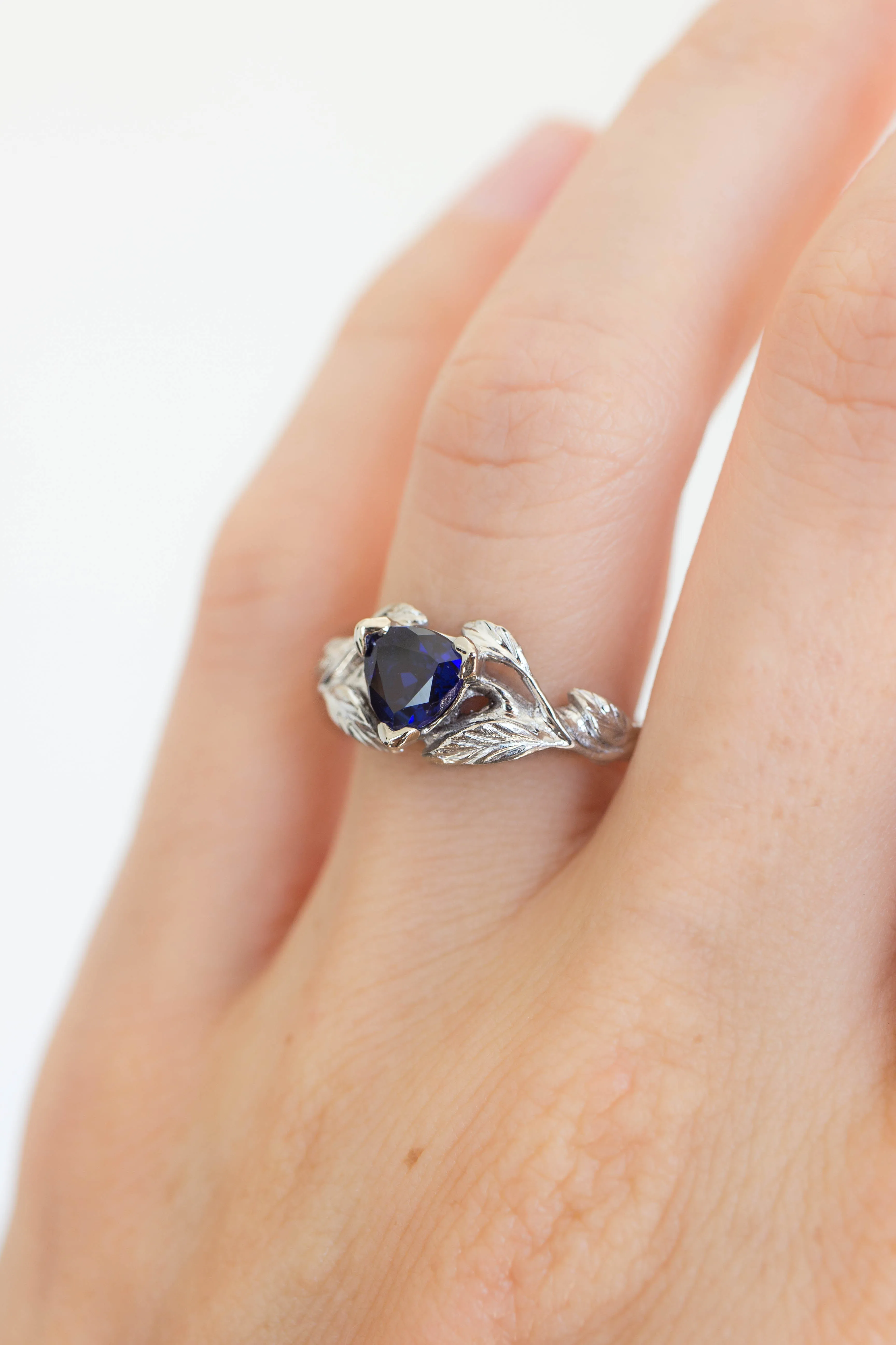 3 months payment plan: trillion cut sapphire ring / Clematis