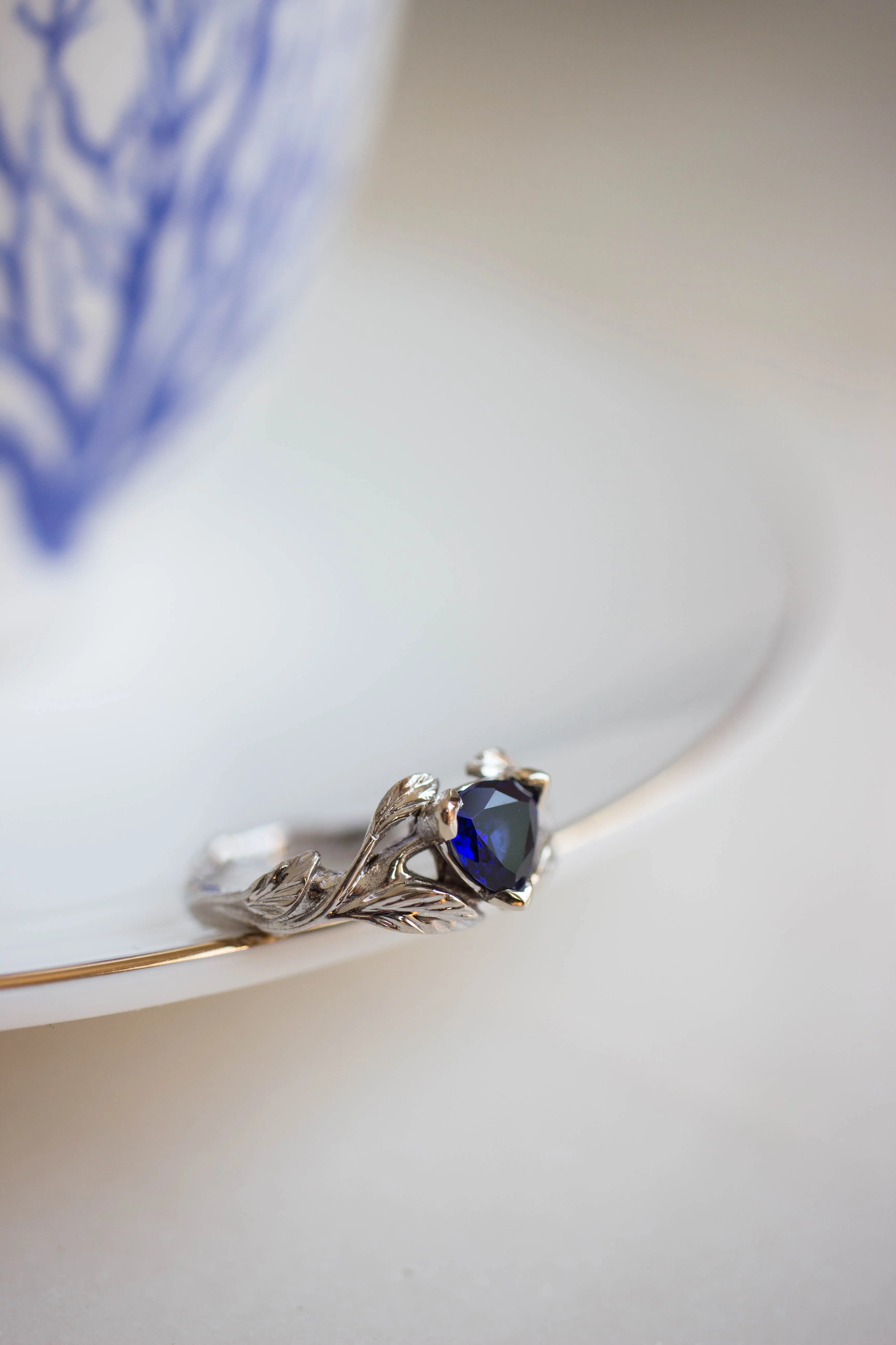 3 months payment plan: trillion cut sapphire ring / Clematis