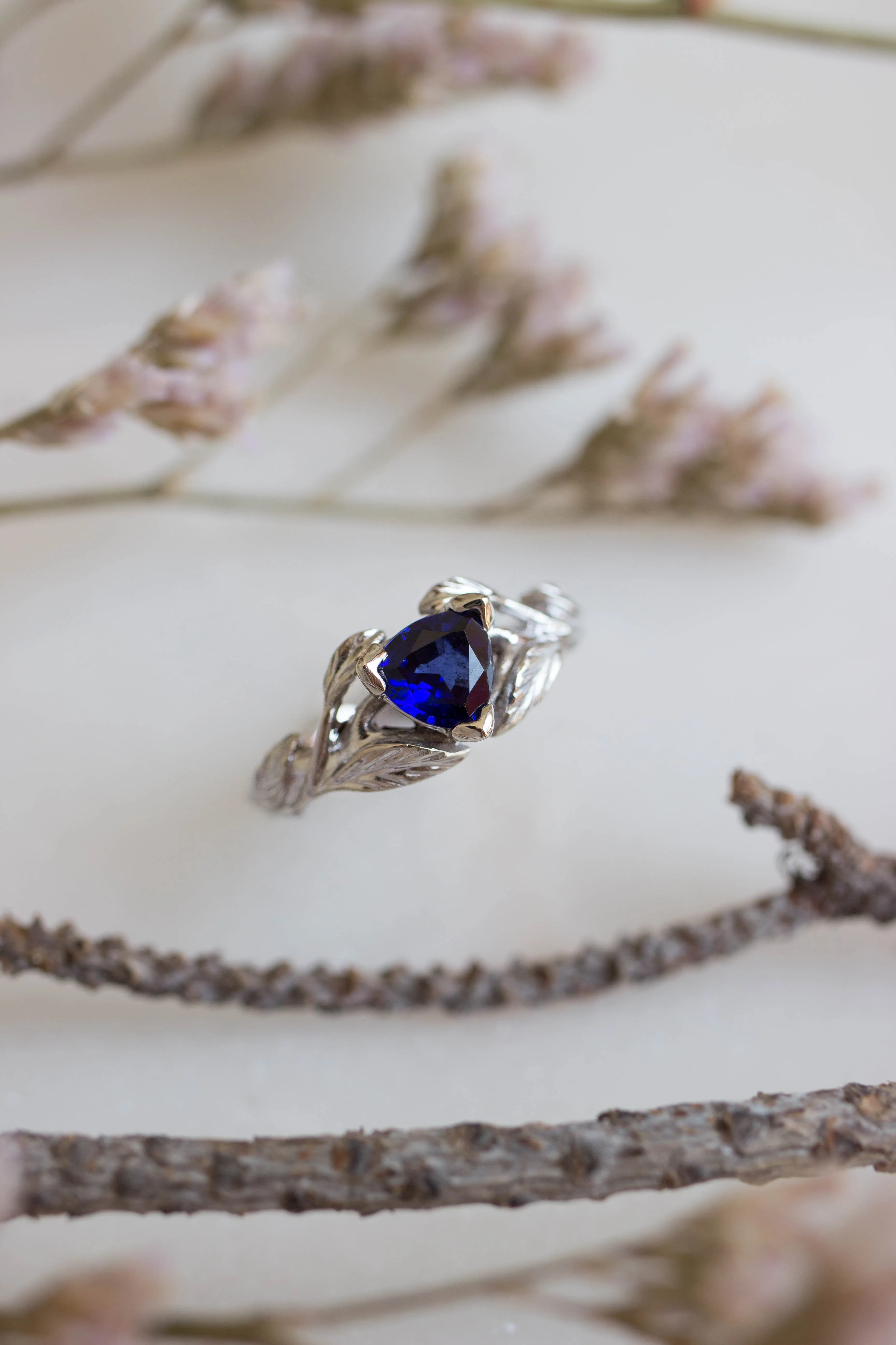 3 months payment plan: trillion cut sapphire ring / Clematis