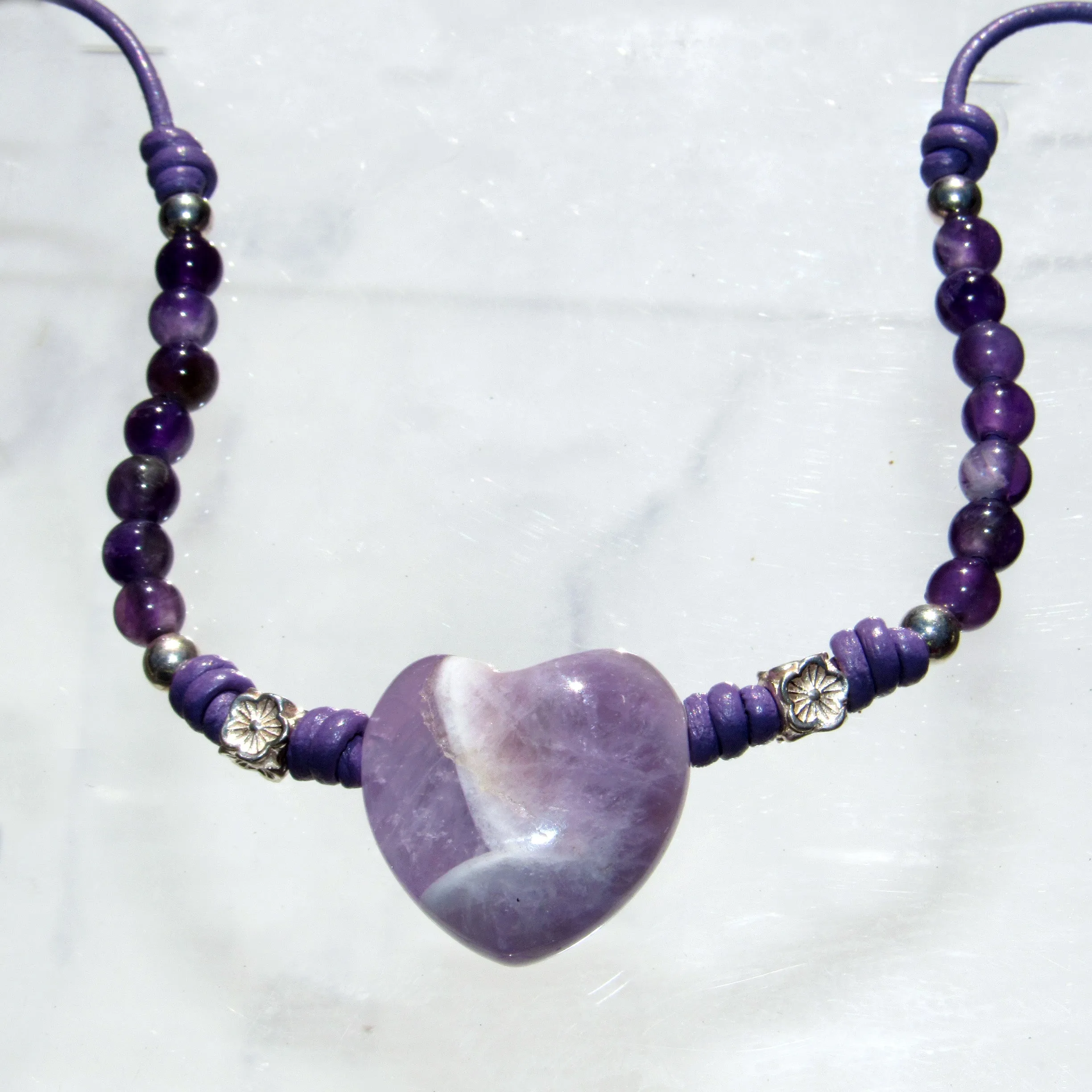 Amethyst gemstone and heart with sterling silver on leather necklace