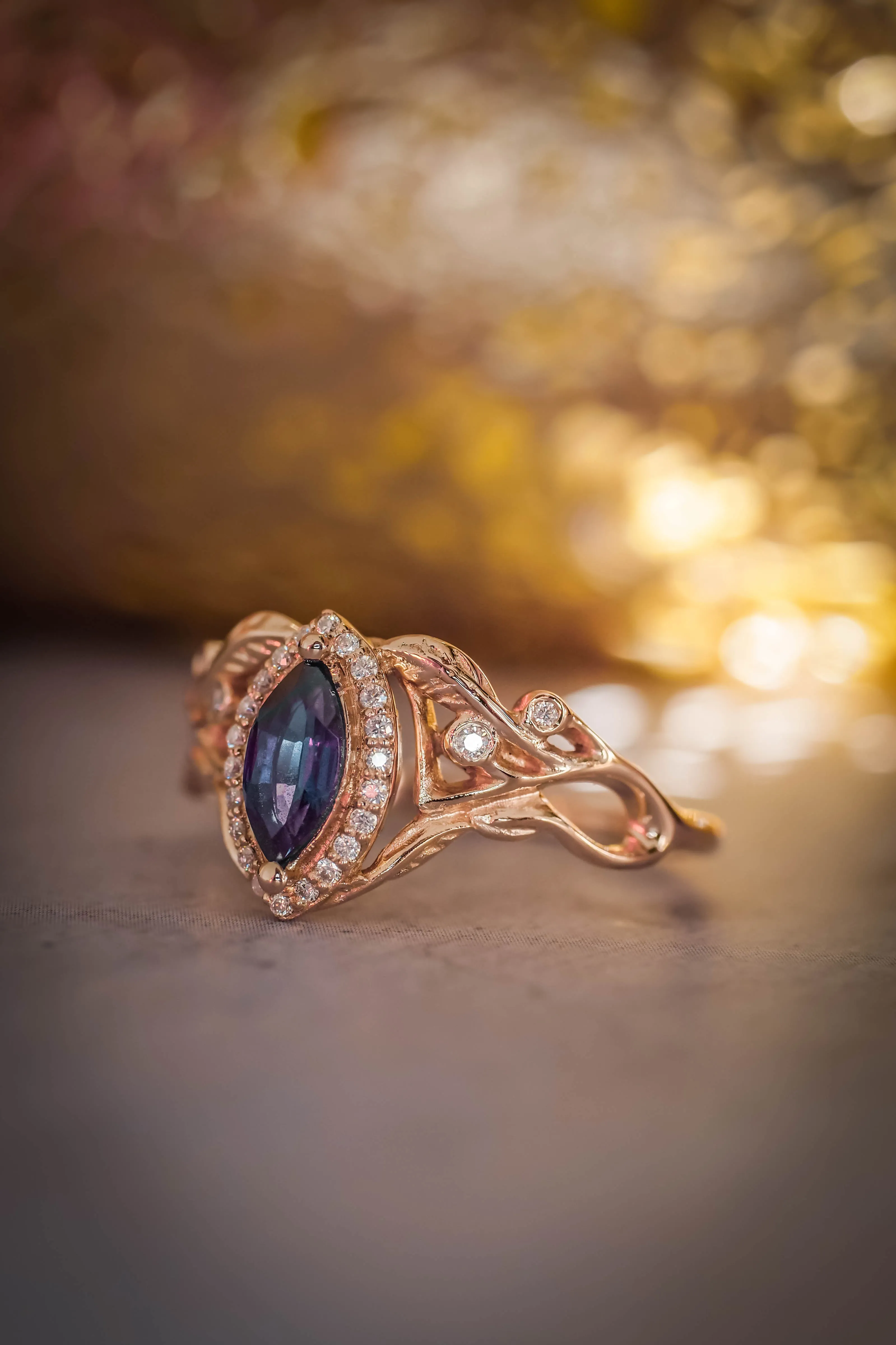 Marquise alexandrite ring with diamond halo / Callisto