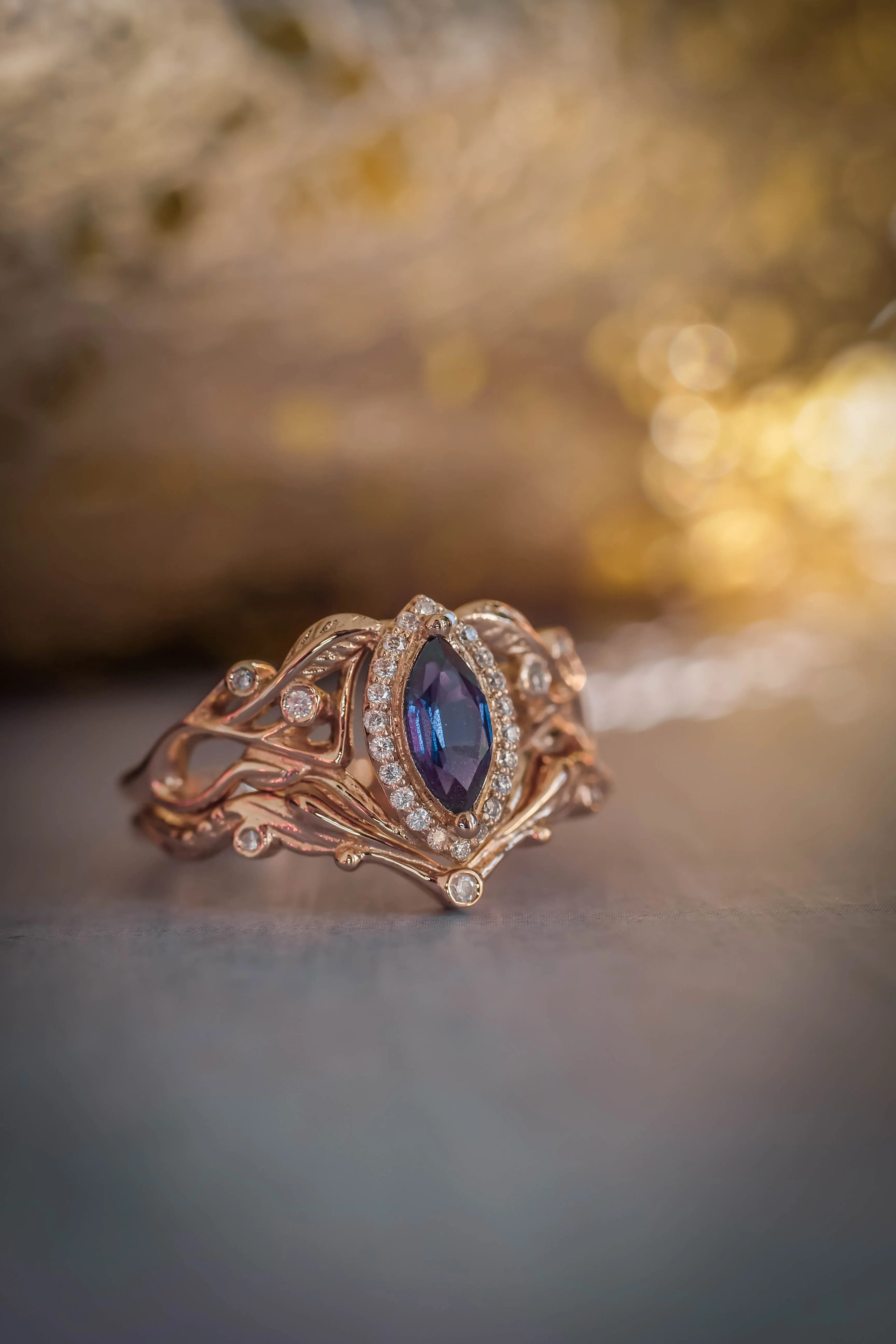 Marquise alexandrite ring with diamond halo / Callisto