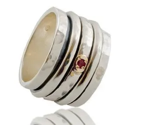 Spinner Ring Jewelry. Sterling Silver and 9kt gold Ring set with Garnet